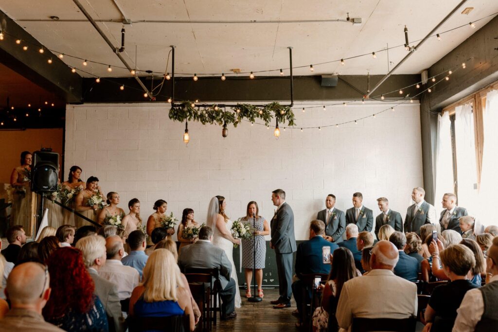 A wedding ceremony in the main venue at Union Pine in Portland, OR.