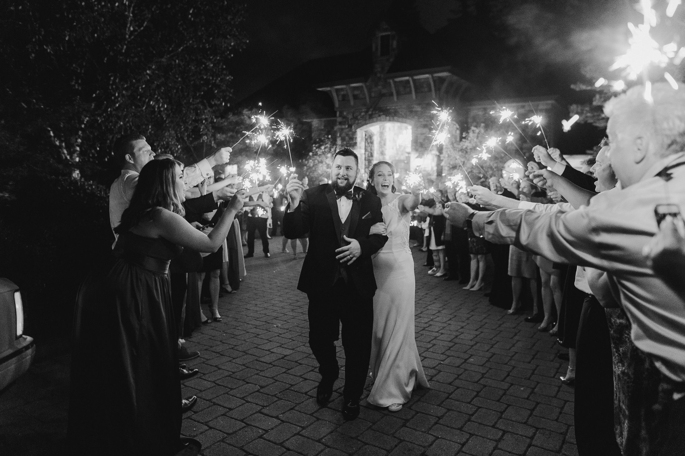 A sparkler send-off at an Aerie at Eagle Landing wedding reception.
