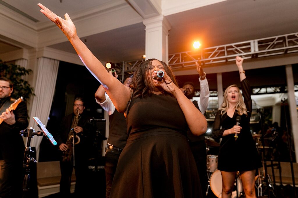 A lead singer in a Portland wedding band at a Waverley Country Club wedding reception.