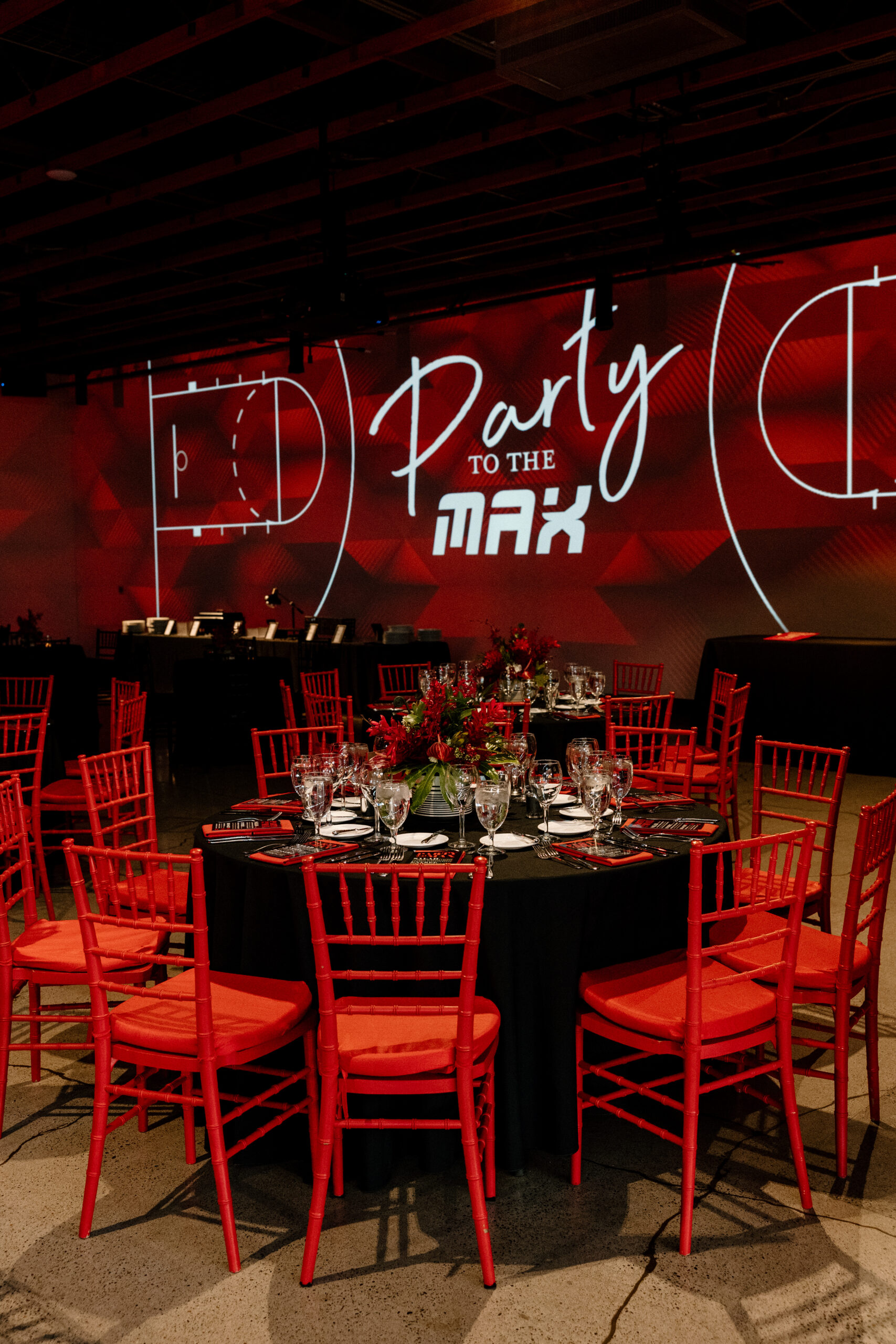Gorgeous red decor at a bar mitzvah party inside the Loft on 8th in Portland.