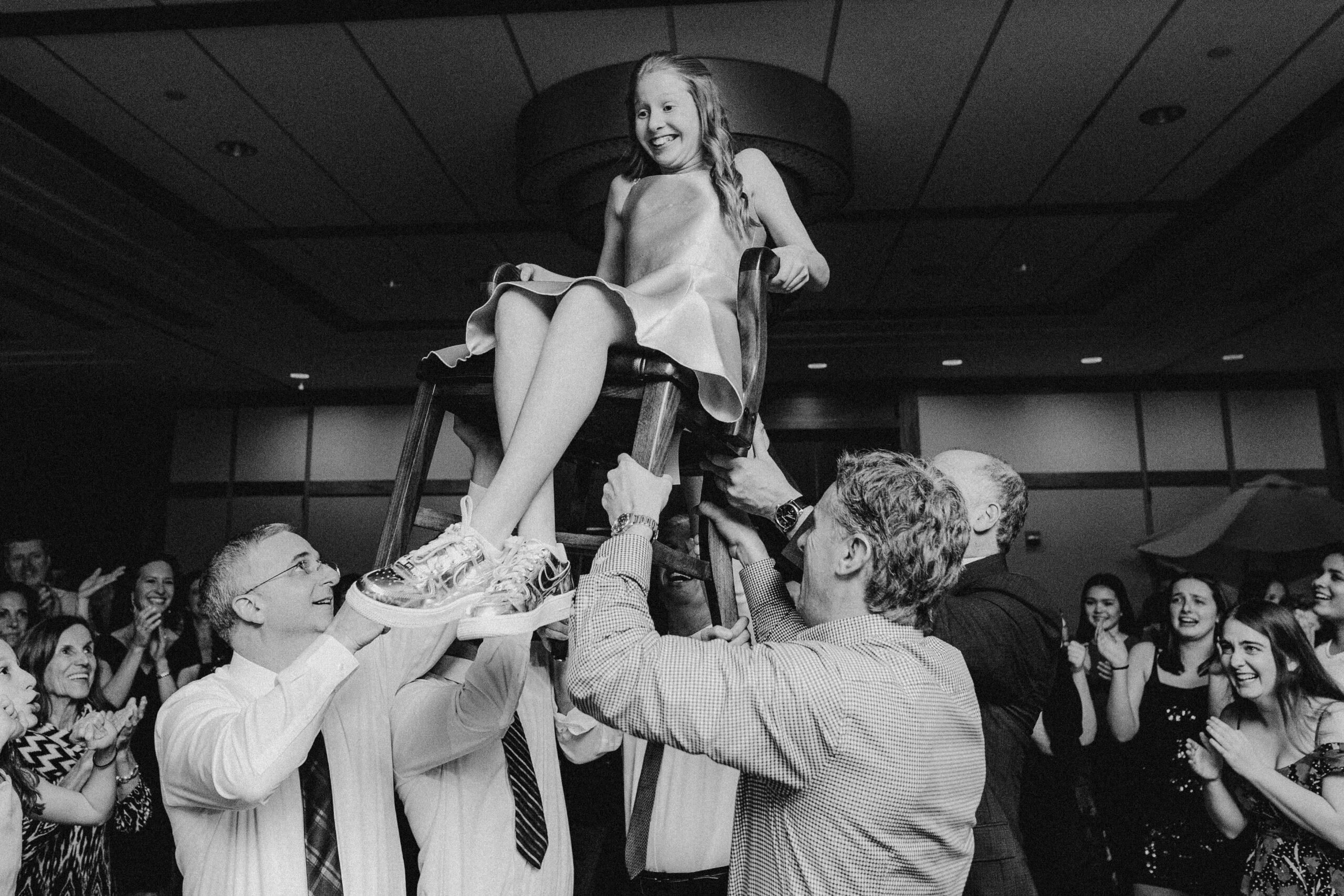 A child doing the hora at her bat mitzvah at the Mac Club in Portland.