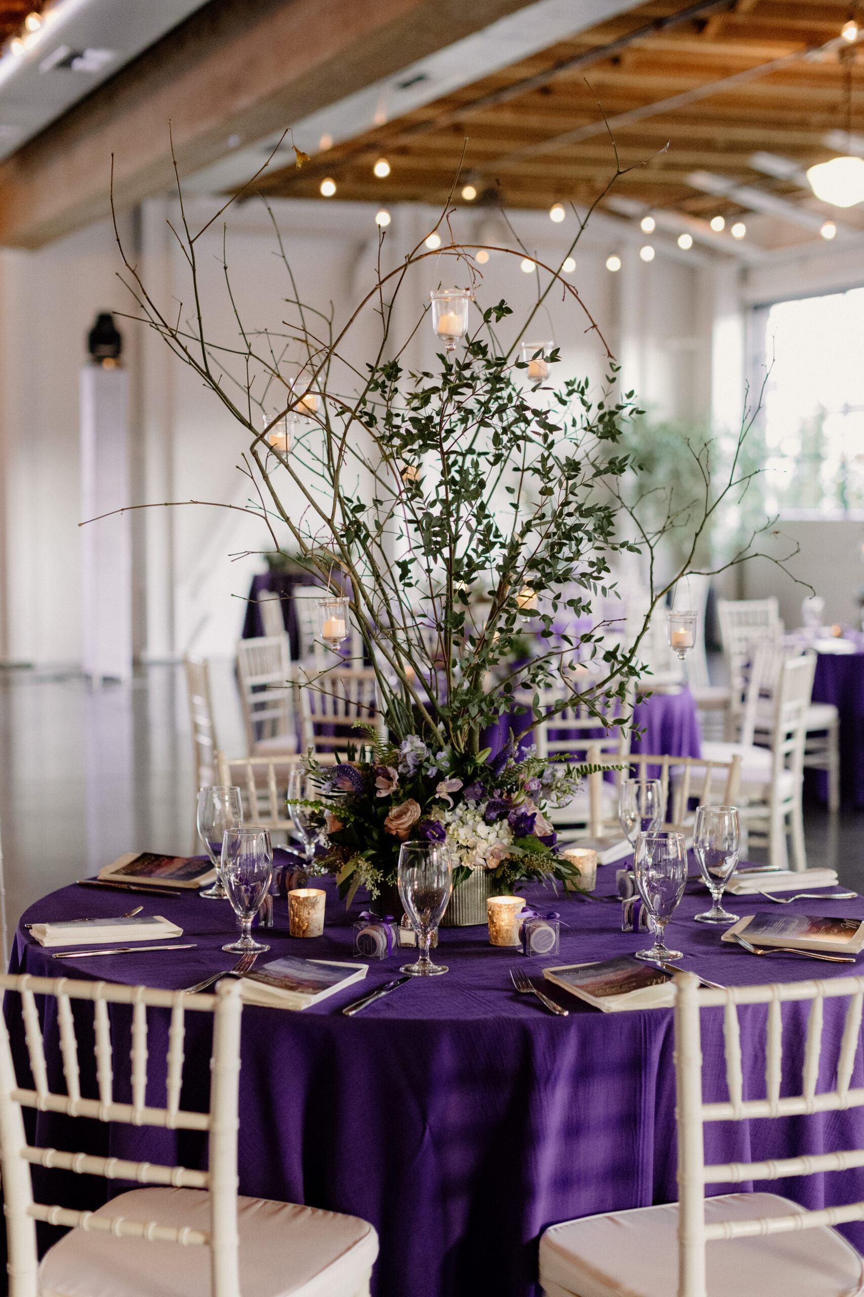 Gorgeous purple and white decor at a bat mitzvah party inside the Castaway venue in Portland.