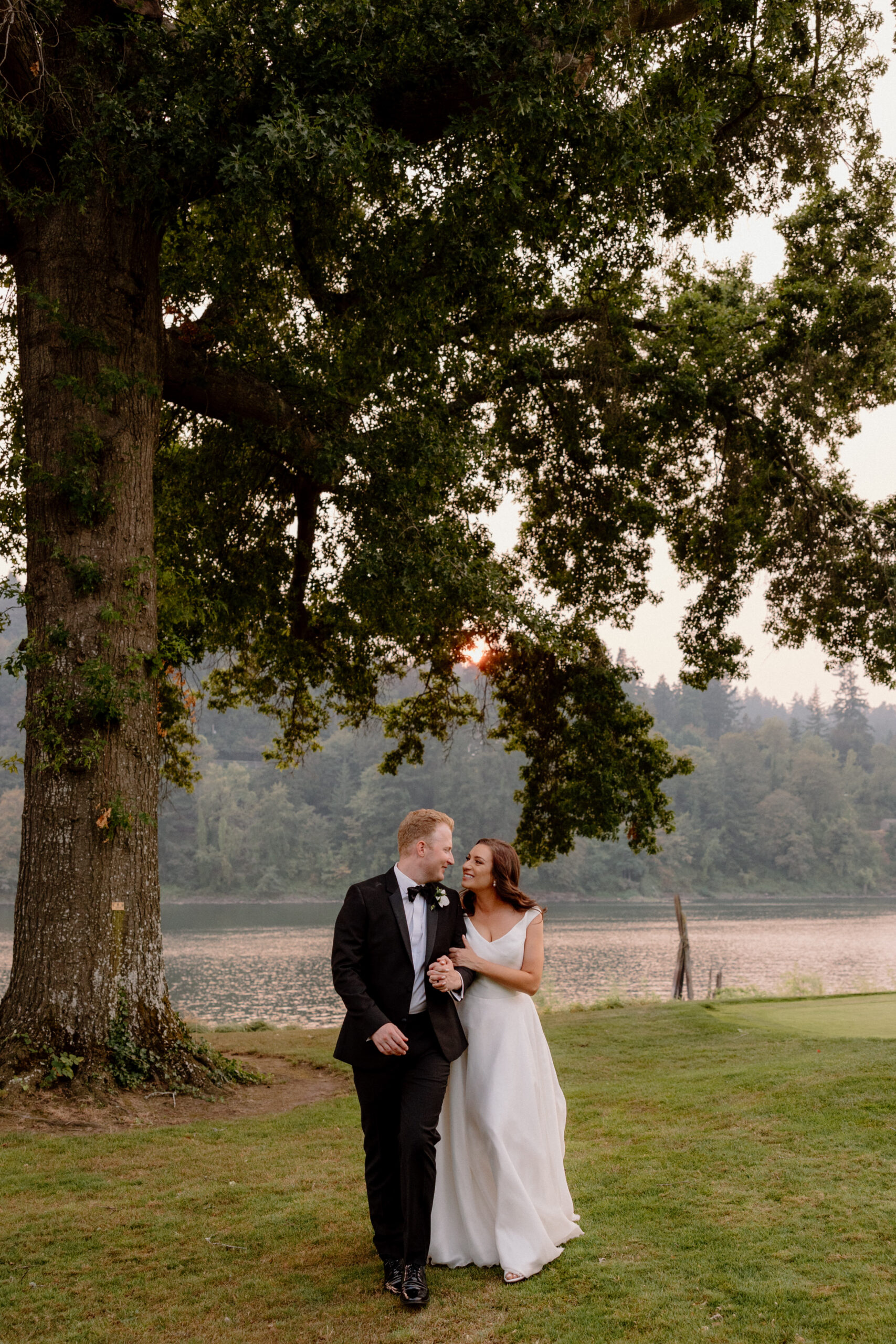 A bride and groom taking sunset photos at their Creekside Estate wedding in Washougal, WA.